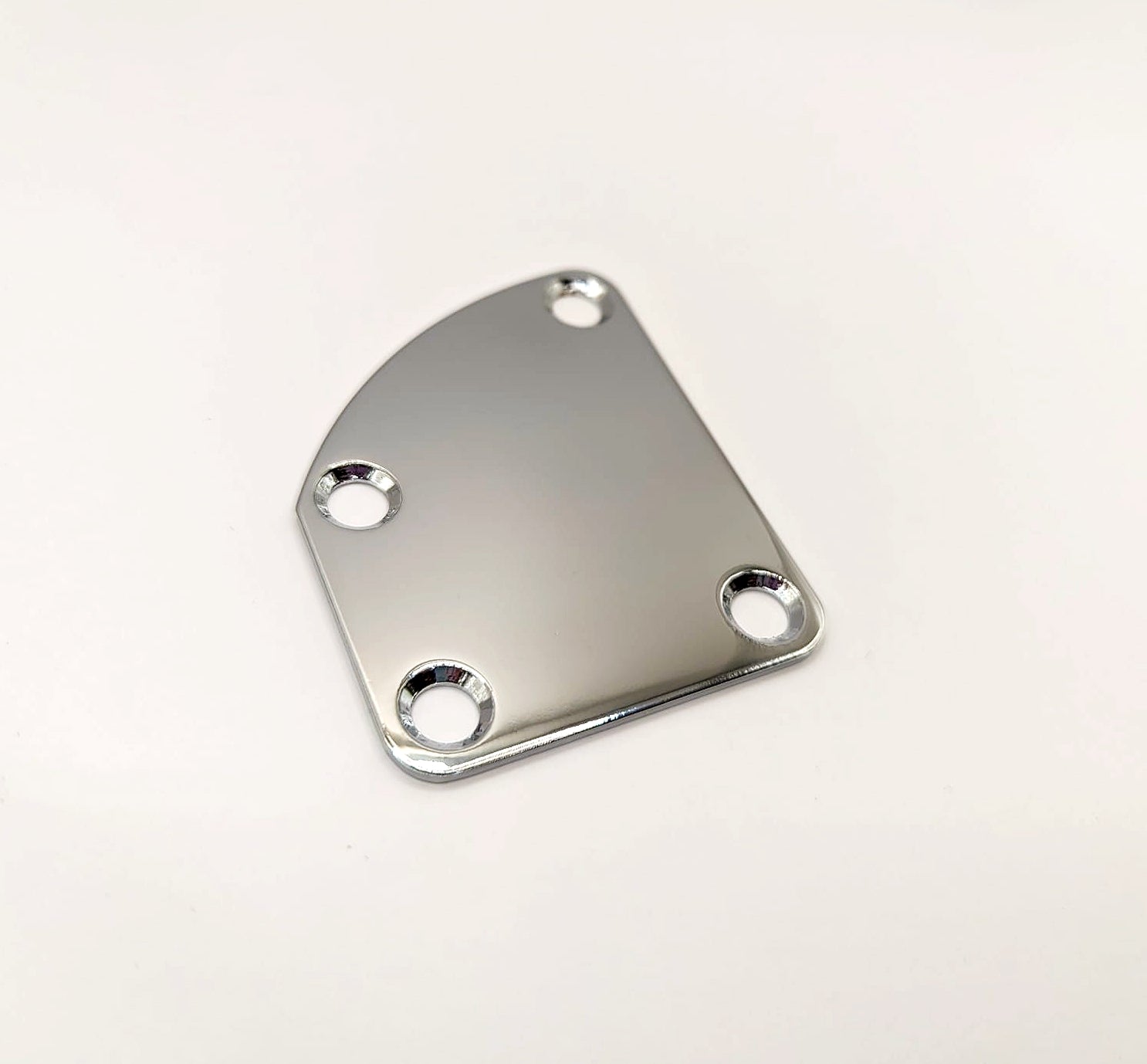 Electric guitar curved neck plate