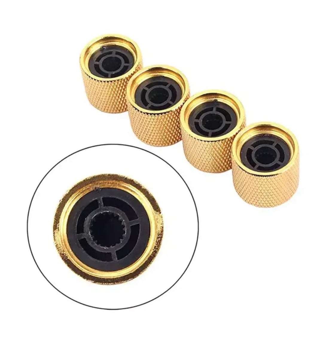 Gold electric guitar knobs